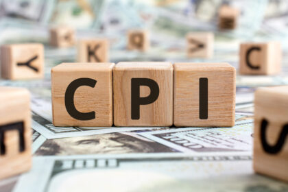 CPI acronym from wooden blocks with letters, abbreviation CPI Consumer price index concept, random letters around, money background